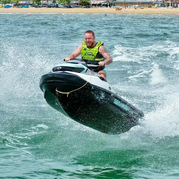 Jet ski activity on clear coastal water in Bintan